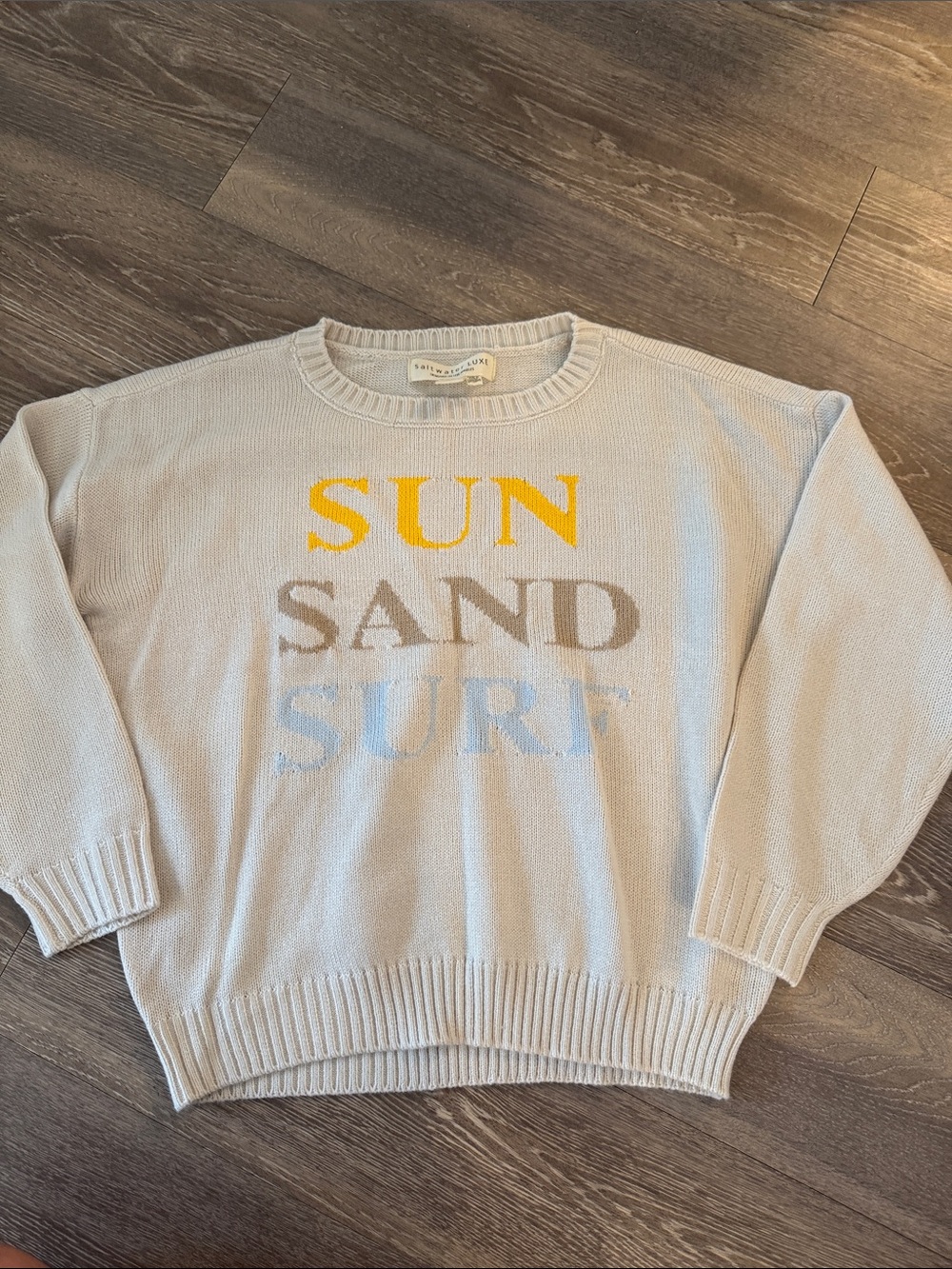 saltwater LUXE Cream Crewneck Sweater with SUN SAND SURF Text